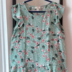 Loft Blouse with beautiful front hem line and sleeve detail.